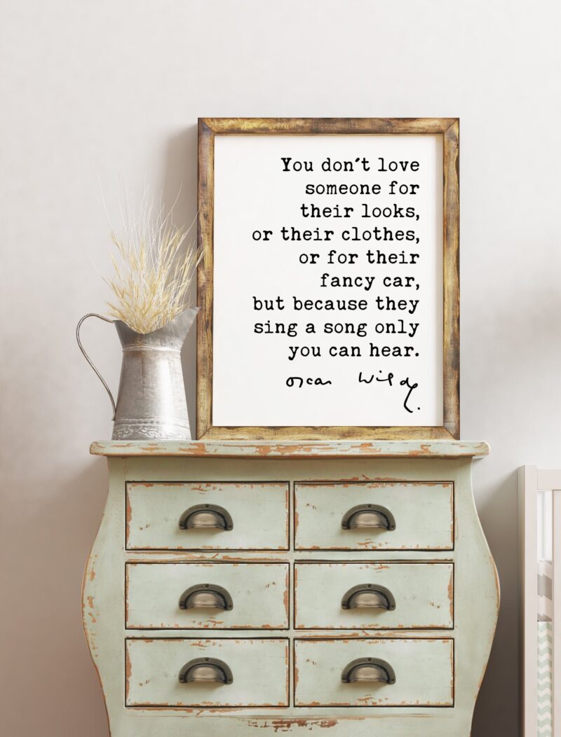 Oscar Wilde Quote - You don't love someone for their looks, ... their fancy car, but because they sing a song only you can hear. Art Print